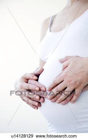 Stock Photo - Expectant couple. Fotosearch