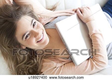 Stock Image - Happy teenage girl. Fotosearch