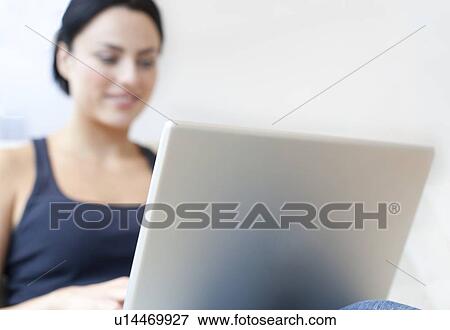 Laptop use View Large Photo Image Stock Photo - Laptop use. Fotosearch