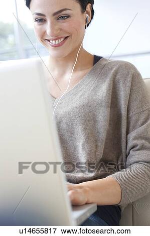 Laptop use View Large Photo Image Stock Photo - Laptop use. Fotosearch