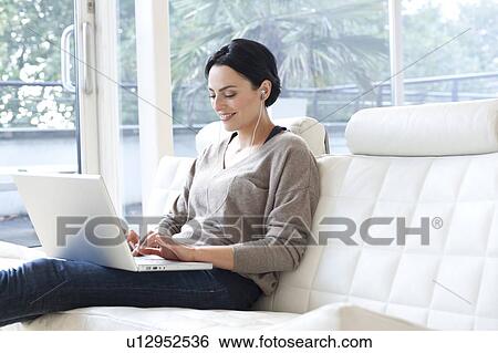 Laptop use View Large Photo Image Stock Photograph - Laptop use. Fotosearch