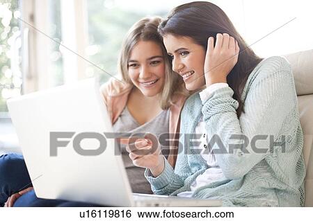 Laptop use View Large Photo Image Stock Photograph - Laptop use. Fotosearch