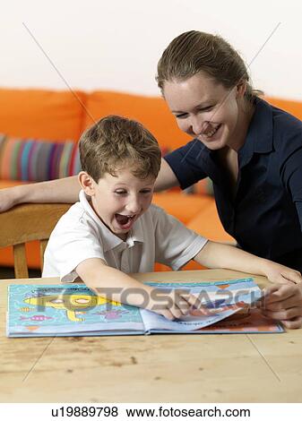 Stock Photo - Learning to read. Fotosearch