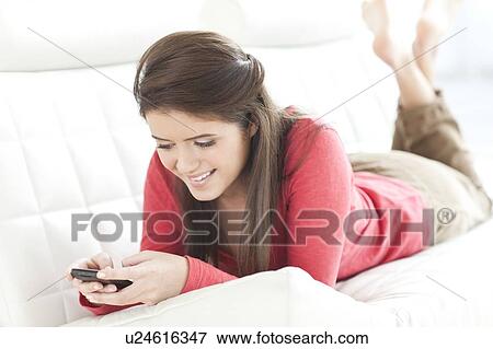 Stock Photo - Mobile phone use. Fotosearch
