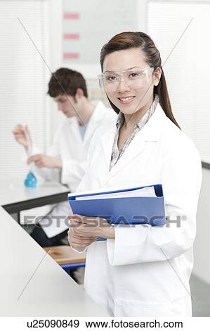 Pupils in a science lesson View Large Photo Image Stock Photo - Pupils in a science lesson. Fotosearch