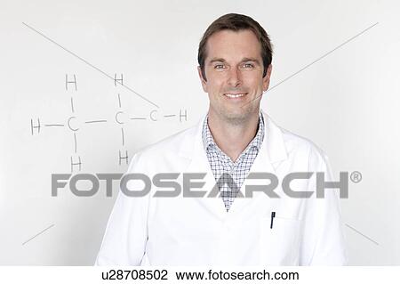 Stock Image - School science teacher. Fotosearch