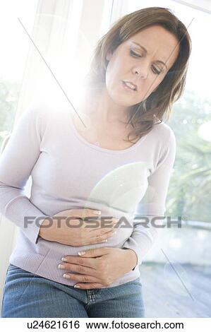 Stock Photograph - Stomach ache. Fotosearch