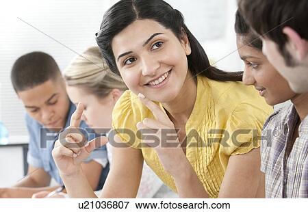 Teacher helping pupils View Large Photo Image Stock Photo - Teacher helping pupils. Fotosearch