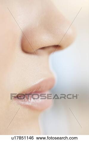 Stock Photograph - Teenage girl's mouth and nose. Fotosearch