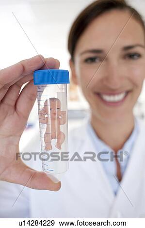 Test tube baby, conceptual image View Large Photo Image Stock Photo - Test tube baby, conceptual image. Fotosearch