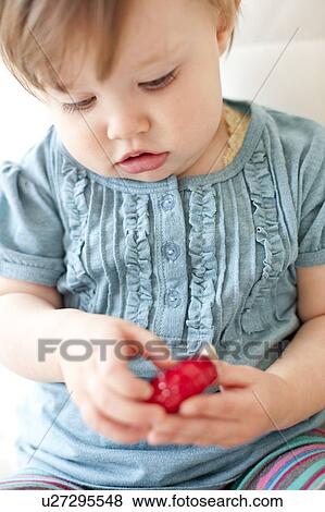 Stock Photo - Toddler eating. Fotosearch