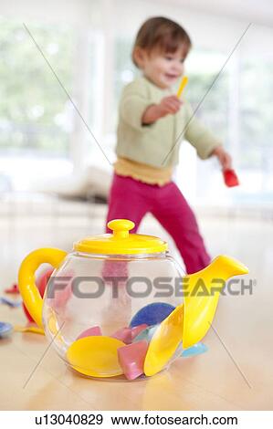 Toddler playing View Large Photo Image Stock Photo - Toddler playing. Fotosearch