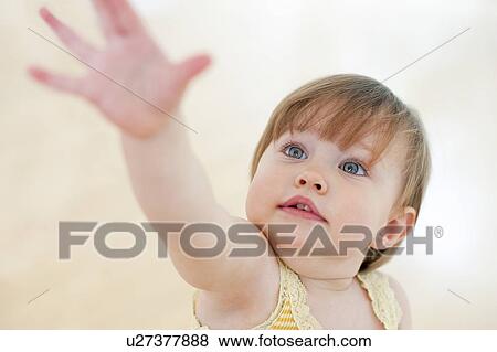 Stock Photo - Toddler reaching. Fotosearch