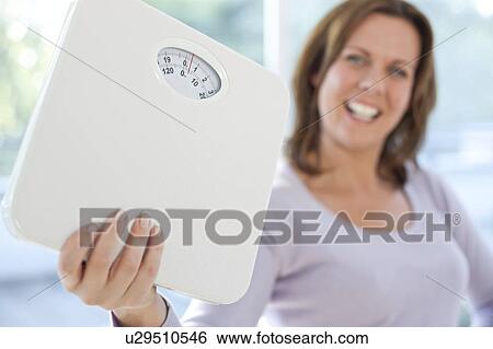 Stock Photograph - Weight loss. Fotosearch