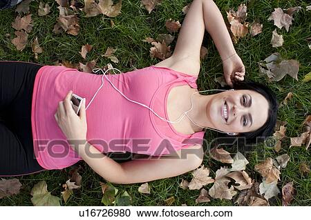 Woman resting after exercise View Large Photo Image Stock Image - Woman resting after exercise. Fotosearch