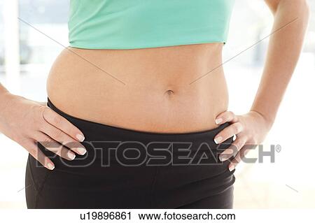 Stock Image - Woman's abdomen. Fotosearch