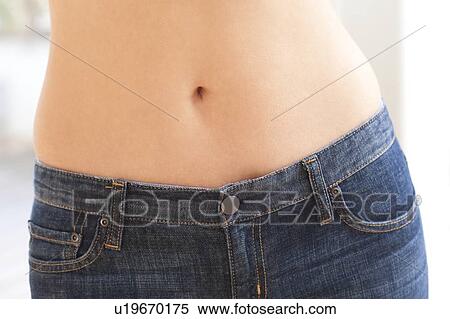 Stock Photography - Woman's abdomen. Fotosearch