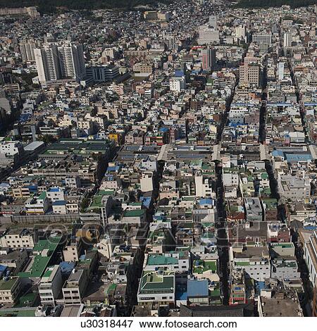 Stock Photo - Aerial view of buildings in Busan city, Yeongnam, South Korea. Fotosearch