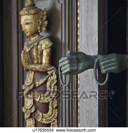 Apsara statue at the entrance of Mandarin Oriental Dhara Dhevi, Chiang Mai, Thailand View Large Photo Image Picture - Apsara statue at the entrance of Mandarin Oriental Dhara Dhevi, Chiang Mai, Thailand. Fotosearch
