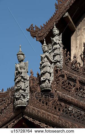 Apsara statues on the top of Mandarin Oriental Dhara Dhevi, Chiang Mai, Thailand View Large Photo Image Picture - Apsara statues on the top of Mandarin Oriental Dhara Dhevi, Chiang Mai, Thailand. Fotosearch