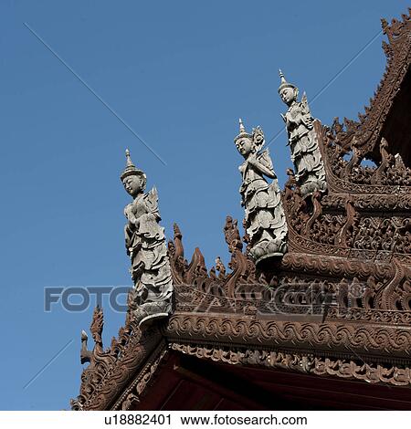 Apsara statues on the top of Mandarin Oriental Dhara Dhevi, Chiang Mai, Thailand View Large Photo Image Stock Image - Apsara statues on the top of Mandarin Oriental Dhara Dhevi, Chiang Mai, Thailand. Fotosearch