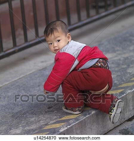 Baby boy on a walkway, Forbidden City, Beijing, China View Large Photo Image Stock Image - Baby boy on a walkway, Forbidden City, Beijing, China. Fotosearch