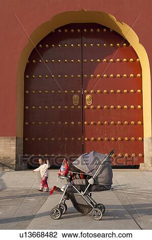 Baby carriage in front of a gate at the Temple Of Heaven, Beijing, China View Large Photo Image Stock Image - Baby carriage in front of a gate at the Temple Of Heaven, Beijing, China. Fotosearch