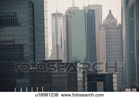 Stock Photo - Buildings in a city, Pudong, Shanghai, China. Fotosearch