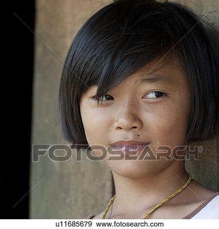 Stock Photo - Close-up of a girl, Chiang Dao, Chiang Mai Province, Thailand. Fotosearch