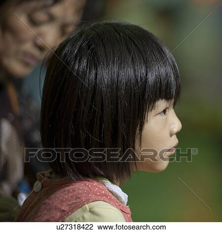 Close-up of a girl, Shanghai, China View Large Photo Image Stock Image - Close-up of a girl, Shanghai, China. Fotosearch