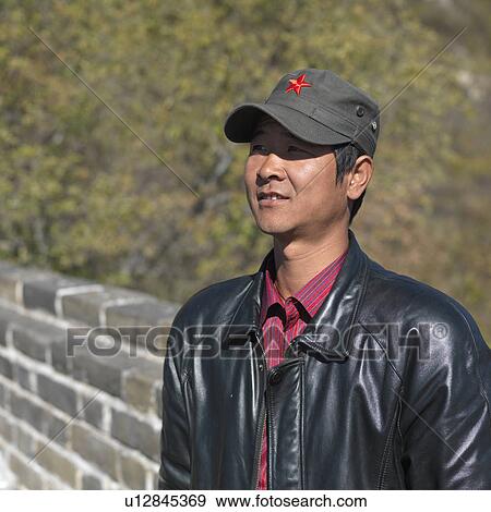 Close-up of a man at the Mutianyu section of the Great Wall of China, Beijing, China View Large Photo Image Stock Photo - Close-up of a man at the Mutianyu section of the Great Wall of China, Beijing, China. Fotosearch