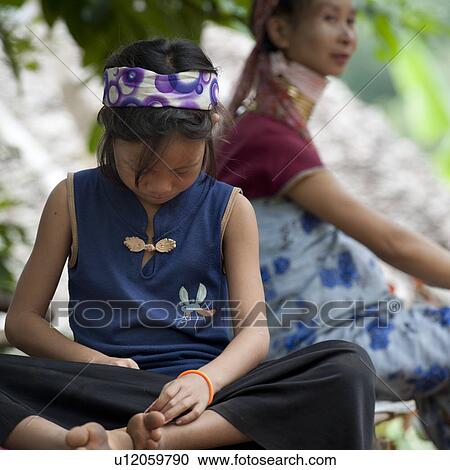 Stock Image - Close-up of a Padaung girl, Huay Pu Keng, Mae Hong Son Province, Thailand. Fotosearch