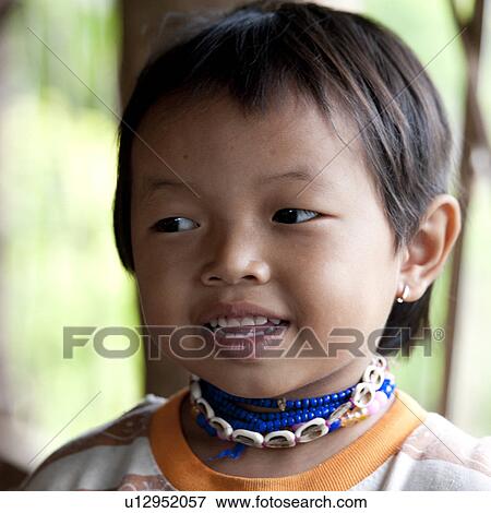 Close-up of a Padaung girl, Huay Pu Keng, Mae Hong Son Province, Thailand View Large Photo Image Stock Photo - Close-up of a Padaung girl, Huay Pu Keng, Mae Hong Son Province, Thailand. Fotosearch