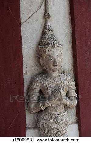 Stock Image - Close-up of a statue at Wat Phra Singh, Chiang Mai, Thailand. Fotosearch