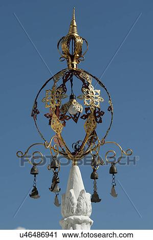 Close-up of bells hanging at Mandarin Oriental Dhara Dhevi, Chiang Mai, Thailand View Large Photo Image Stock Image - Close-up of bells hanging at Mandarin Oriental Dhara Dhevi, Chiang Mai, Thailand. Fotosearch