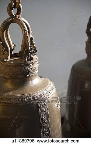Stock Photograph - Close-up of bells hanging at Wat Phrathat Doi Suthep, Chiang Mai, Thailand. Fotosearch