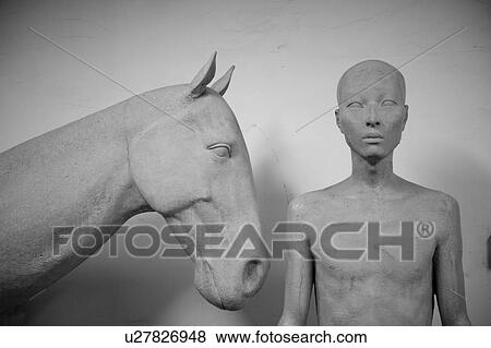 Stock Photo - Close-up of statues in the Ke Center for the Contemporary Arts, Shanghai, China. Fotosearch