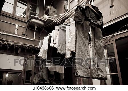 Clothes drying on a clothesline, Shanghai, China View Large Photo Image Stock Photograph - Clothes drying on a clothesline, Shanghai, China. Fotosearch