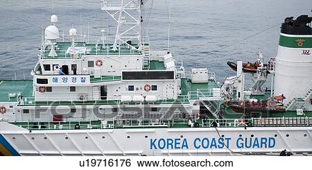 Coast guard ship at Busan Harbor, Busan, Yeongnam, South Korea View Large Photo Image Stock Photograph - Coast guard ship at Busan Harbor, Busan, Yeongnam, South Korea. Fotosearch
