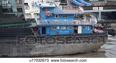 Container ship at a commercial dock, Yangtze River, Shanghai, China View Large Photo Image Stock Image - Container ship at a commercial dock, Yangtze River, Shanghai, China. Fotosearch