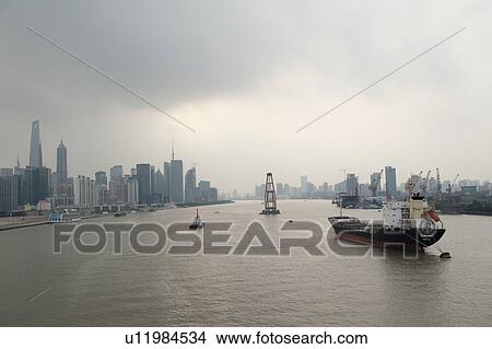 Picture - Container ship in the Huangpu River, Pudong, Shanghai, China. Fotosearch