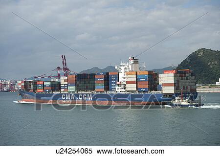 Stock Photography - Container ship in the sea, Busan, Yeongnam, South Korea. Fotosearch