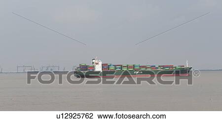 Stock Image - Container ship in the Yangtze River, Shanghai, China. Fotosearch