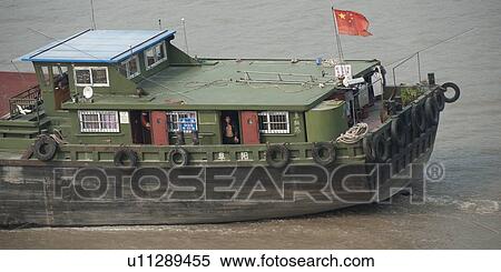Stock Photography - Container ship in the Yangtze River, Shanghai, China. Fotosearch