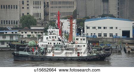 Container ships at a commercial dock, Yangtze River, Shanghai, China View Large Photo Image Picture - Container ships at a commercial dock, Yangtze River, Shanghai, China. Fotosearch
