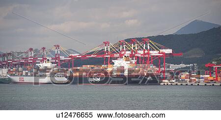 Stock Photography - Container ships at Busan harbor, Busan, Yeongnam, South Korea. Fotosearch
