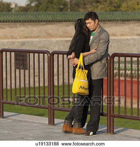 Couple romancing at the Temple Of Heaven, Beijing, China View Large Photo Image Stock Photo - Couple romancing at the Temple Of Heaven, Beijing, China. Fotosearch