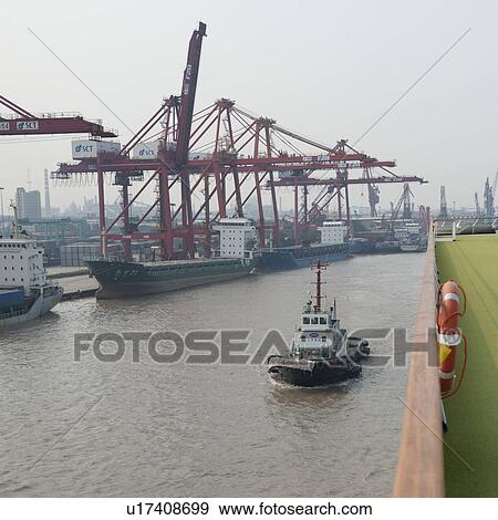 Cranes at a commercial dock, Yangtze River, Shanghai, China View Large Photo Image Stock Photo - Cranes at a commercial dock, Yangtze River, Shanghai, China. Fotosearch