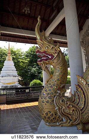 Stock Photograph - Dragon statue at Wat Phra Singh, Chiang Mai, Thailand. Fotosearch