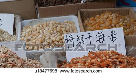 Dried food at a market stall, Binhai, Tianjin, China View Large Photo Image Stock Photo - Dried food at a market stall, Binhai, Tianjin, China. Fotosearch